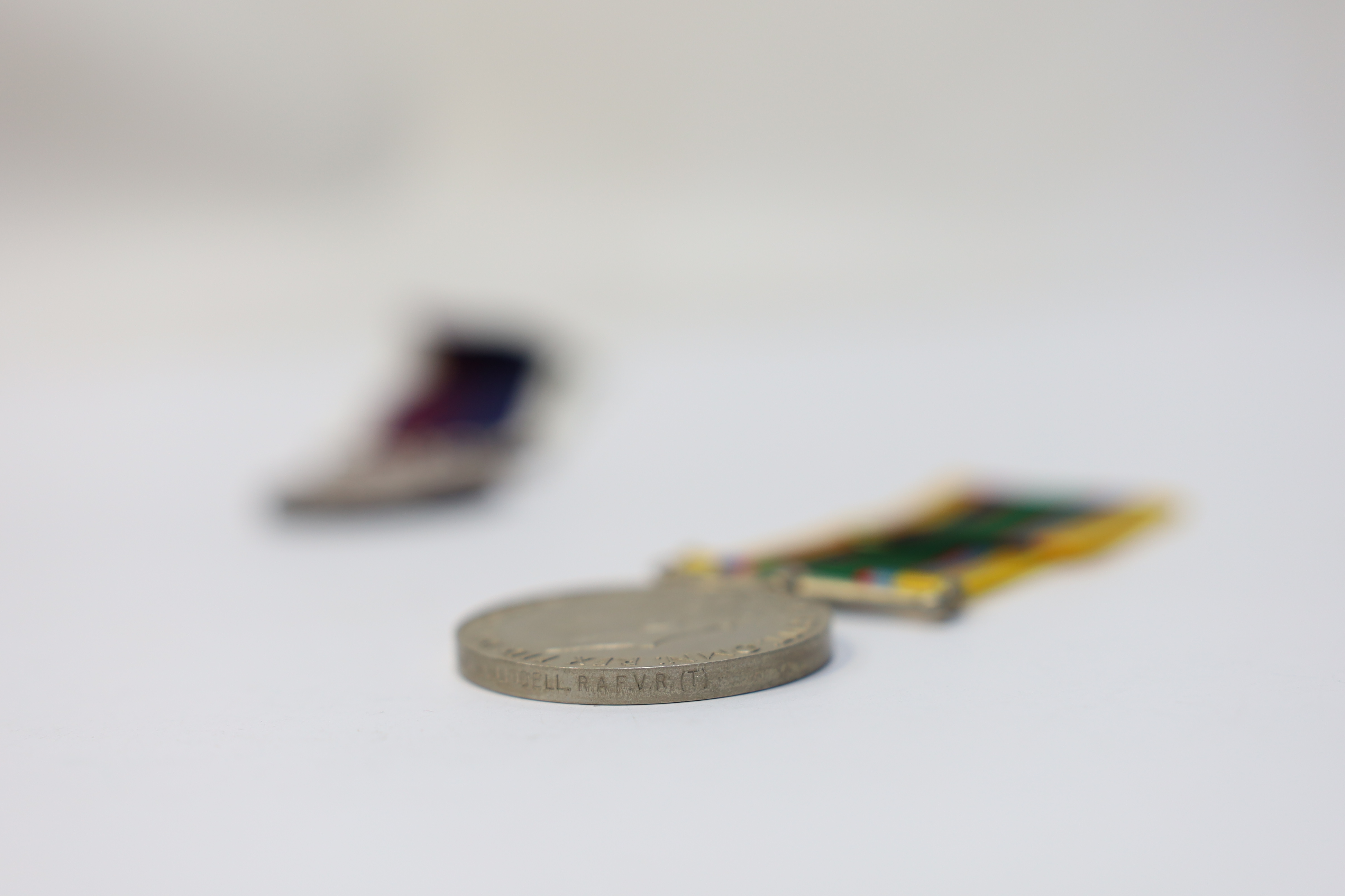 Three assorted service medals; GVI Cadet Forces medal to ACT. FG. Off. A. Liddell R.A.F.V.R (T); ERII Civil Defence Long Service medal unnamed; ERII RAFLSGC to E2418184 Cpl G R B Lowe RAF. Condition - fair to good.